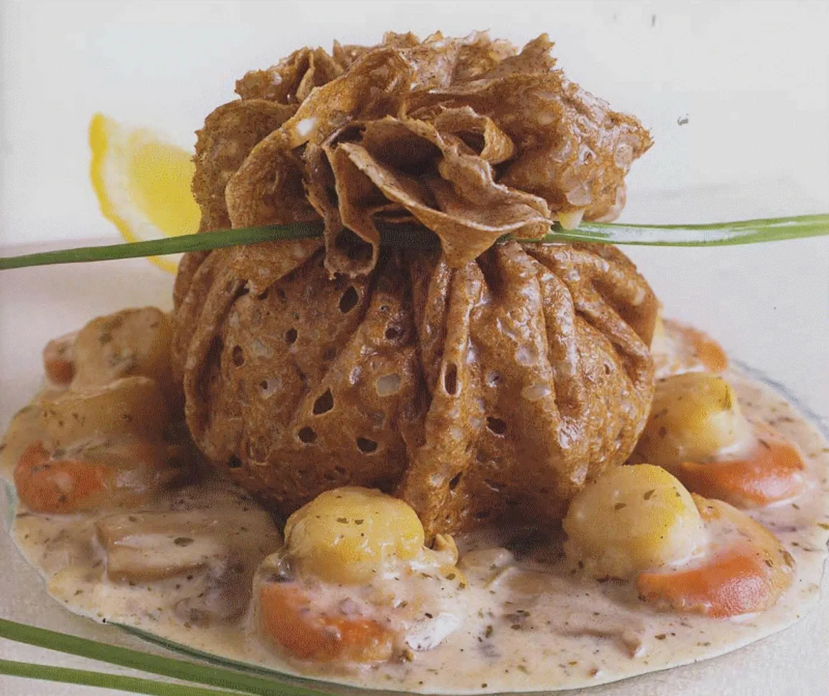 Galette aux noix de Saint-Jacques et petits légumes